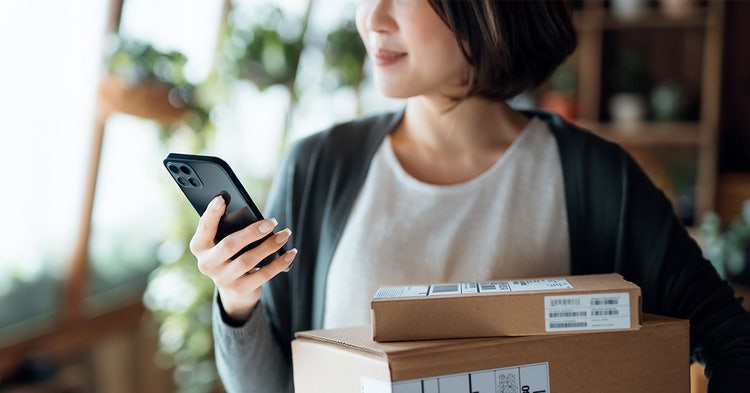 Woman receives packages at home